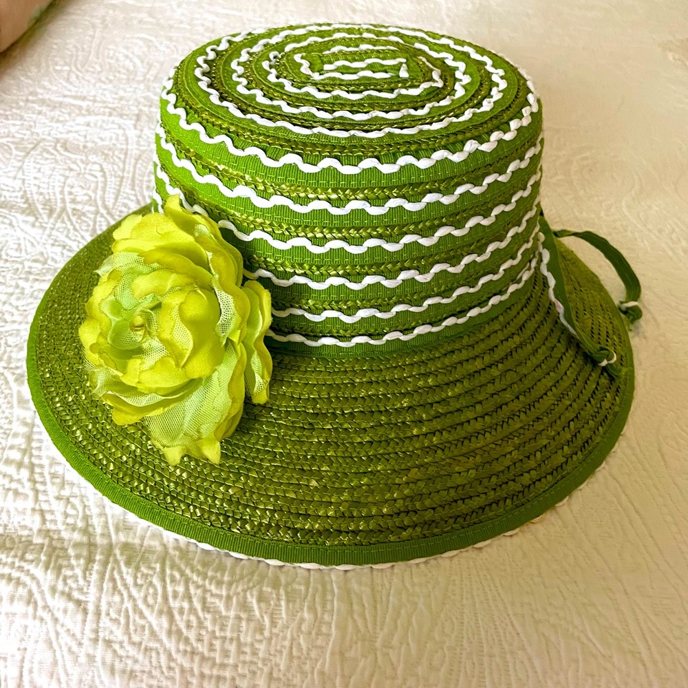 Straw hat in grass green with white accents.